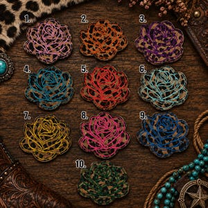 May include: Ten embroidered rose patches with leopard print backgrounds, numbered one through ten. Each patch features a distinct thread color: pink, orange, purple, light blue, red, teal, yellow, magenta, dark blue, and dark green.
