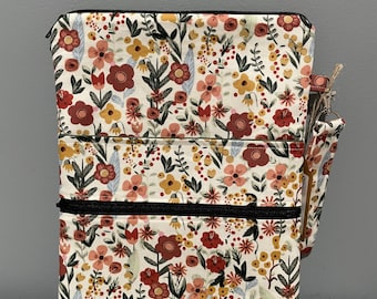 Small zipper closure book sleeve with front zipper pocket