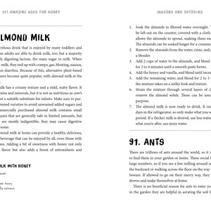May include: A two-page spread from a book titled "101 Amazing Uses for Honey." The left page features text about almond milk, including a recipe. The right page details how to make almond milk. The pages are bordered by gray vertical bars.