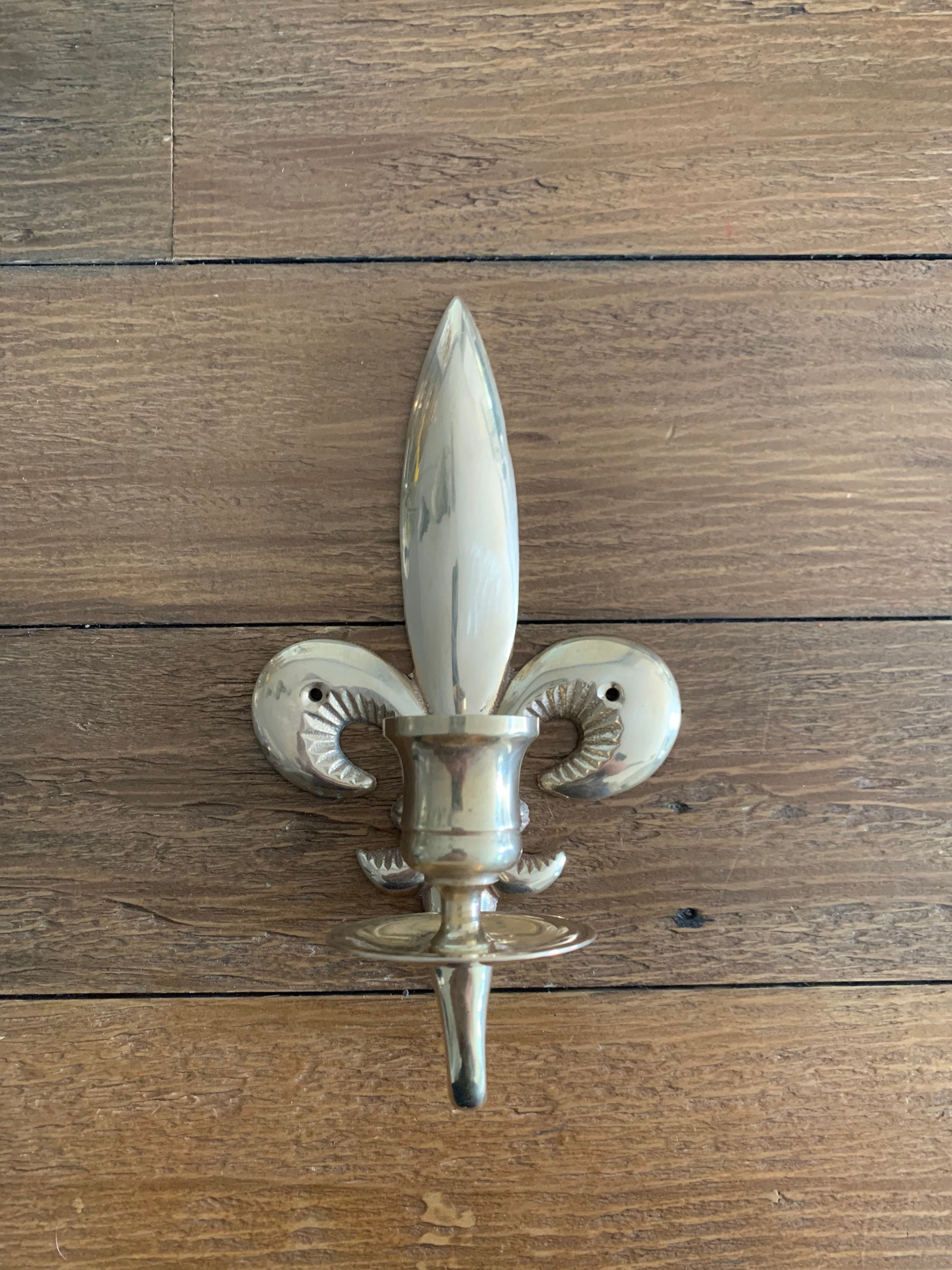 Fleur de lis sconce deals