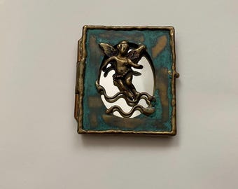 vintage pocket mirror with cherub