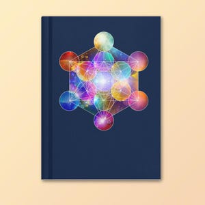 May include: A navy blue journal featuring a colorful Metatron's Cube design. The geometric pattern is composed of interconnected circles and lines, with a vibrant array of colors including pink, orange, yellow, green, and blue. The cover has a smooth texture.
