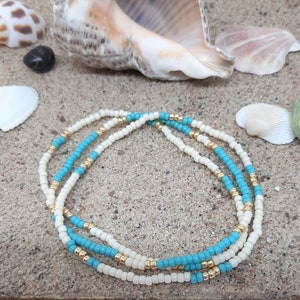 Turquoise, gold, and cream seed bead elastic stackable anklet bracelets. 3 stretch anklets.