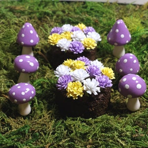 Fairy garden accessories. 8 piece set. Six light purple mushrooms and 2 flower beds.