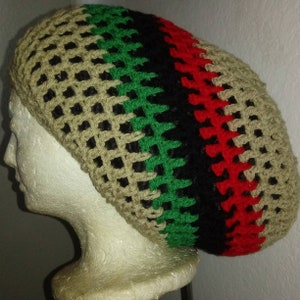 May include: A crocheted beanie hat with a brown, green, black, and red striped pattern. The hat is made of a soft, breathable material and is perfect for everyday wear.