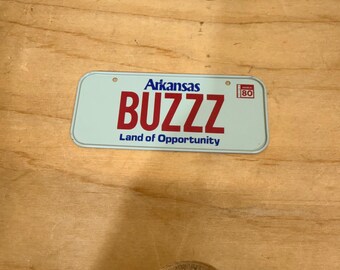 Mini placa de carro do Arkansas, bicicleta azul, BUZZZ, Terra das Oportunidades, vintage de 1980.