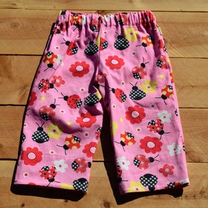 Pink ladybug pants for girls. Cute pants for girls with red and pink ladybugs. image 2