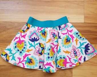 Modern print twirl skirt for toddler with turquoise belt/elastic waist. SIZE 2T only