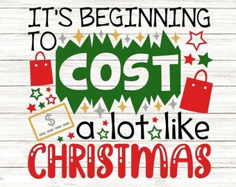 May include: A festive graphic with the text "It's Beginning to Cost a lot like Christmas" in red, green, and white. The design includes shopping bags, stars, and a price tag, perfect for holiday-themed crafts.