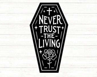 May include: Black coffin-shaped graphic with the text "NEVER TRUST THE LIVING" in white. A cross and stars are at the top, and a rose is at the bottom. The background is a light wood grain.