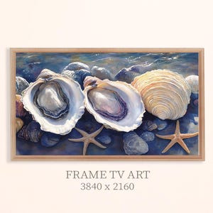 May include: A framed print featuring a coastal scene with open oyster shells, starfish, and rocks. The artwork has a watercolor style with shades of blue, white, and beige. The text "FRAME TV ART" and dimensions are at the bottom.
