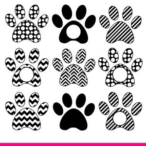 May include: A collection of nine black and white paw print designs arranged in a grid. The paw prints feature various patterns including polka dots, diagonal stripes, and chevron zigzags, with some designs containing circular cutouts for monograms.