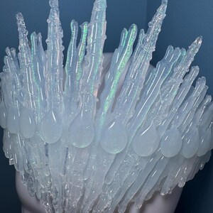Iridescent Jewelled Ice Queen Crown.  A sculptured clear transparent real ice-like icicle crown with ice like ‘jewels’ and iridescence captured within each icicle and jewel.