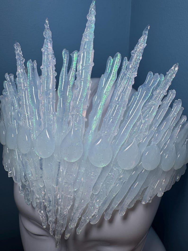 Iridescent Jewelled Ice Queen Crown.  A sculptured clear transparent real ice-like icicle crown with ice like ‘jewels’ and iridescence captured within each icicle and jewel.