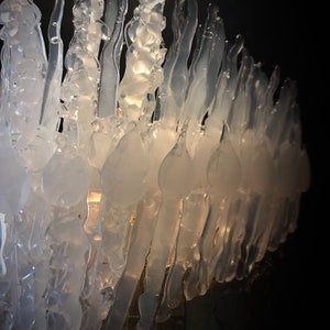 Close up of the clear transparent Jewelled Ice Queen Crown. A sculptured real ice-like icicle crown with ice like ‘jewels’.