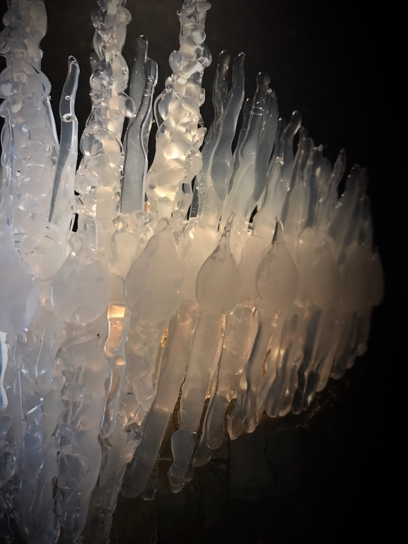Close up of the clear transparent Jewelled Ice Queen Crown. A sculptured real ice-like icicle crown with ice like ‘jewels’.