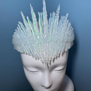 Iridescent Jewelled Ice Queen Crown.  A sculptured clear transparent real ice-like icicle crown with ice like ‘jewels’ and iridescence captured within each icicle and jewel.
