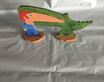 arte, Cabeza de monstruo, Curiosidad de escritorio, un monstruo verde se come a un hombre con pantalones azules, Arte para locos