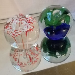 Paperweights/Spheres/Orbs Colorful floral two, Cobalt blue base/green flower lrg bubble, white red long stem flowers smaller bubble. vintage