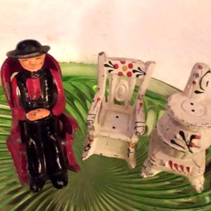 Salt and Pepper Shakers Cast Iron Salt ; older man/Abraham Lincoln in Rocking Chair, Pot Belly Stove/Rocking Chair, Vintage 2 Sets