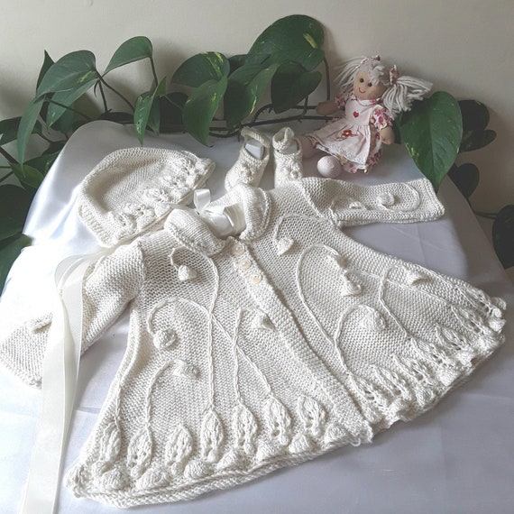 Handknitted Little Cream Coat with Vines, Bells & Bonnet.