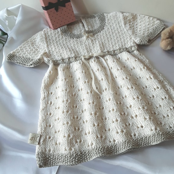 Hand Knitted Lace Baby Dress in 100% Cotton.