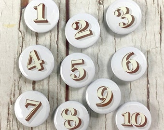 Birthday Button Badges. Number's 1, 2, 3, 4, 5, 6, 7, 8, 9, 10 'Stirling Shadow' font. Two Sizes: small 25mm, large 38mm