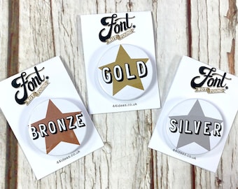 Sports Day badges Gold, Silver, Bronze. Winners awards, first prize, competition, medal Pin's Small 25mm, large 38mm.