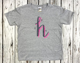 Kids Alphabet T-Shirt. Neon pink, glitter custom clothing with your Child's monogram. Children's initial Shirt- 'The Monroe' font.