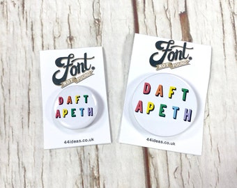 Daft Apeth pin badges. Word lover. Yorkshire slang Button rainbow of colours. 25mm/ 1 inch.