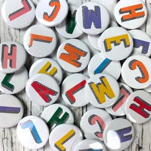 Alphabet pin badges. Word lover. Letter Button rainbow of colours. ''Bradford Buzz' font. Small 25mm, Large 38mm Name initial A-Z image 8