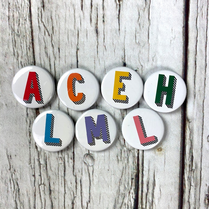 Alphabet pin badges. Word lover. Letter Button rainbow of colours. ''Bradford Buzz' font. Small 25mm, Large 38mm Name initial A-Z image 9