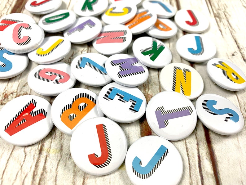 Alphabet pin badges. Word lover. Letter Button rainbow of colours. ''Bradford Buzz' font. Small 25mm, Large 38mm Name initial A-Z image 10