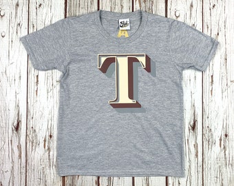 Baby Letter T-Shirt. Infant Alphabet. Personalize your Baby's Monogram Initial top - Stirling Shadow Font.