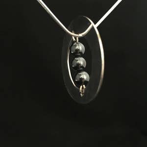 The thread hematite in solid silver