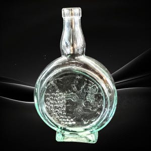 Embossed Grape Bunches Round Glass Bottle