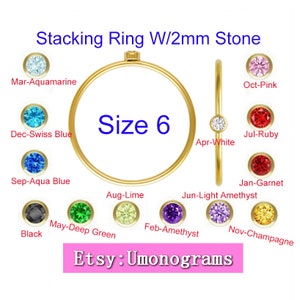 Puede incluir: Anillo apilable de oro con una piedra de 2 mm. El anillo es talla 6. La imagen muestra el anillo con piedras de diferentes colores para cada mes del año. El texto "Etsy: Umonograms" está en la parte inferior de la imagen.