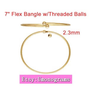 May include: A 7-inch gold-toned flex bangle bracelet with threaded balls. The bracelet is 2.3 mm wide. Etsy: Umonograms