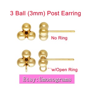 May include: Gold 3-ball post earrings with a 3mm ball size. The earrings are shown with and without an open ring.