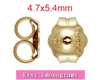 May include: A pair of gold-tone earring backs, each measuring 4.7 x 5.4 mm. The backs are designed to secure earrings in place. The back on the left is a double-loop style, while the back on the right is a butterfly style.