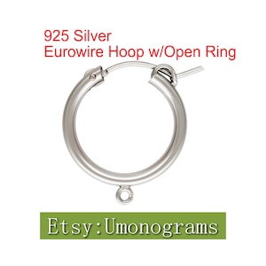 May include: A silver Euro-wire hoop earring with an open ring. The earring is 925 silver and has a small loop at the bottom.