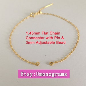 14 kt geelgoud gevuld 1,45 mm platte kabelketting 6,5/7/7,5/8 inch armbandconnector met 2 open ringetjes/pen en 3 mm verstelbare stopkraal GF