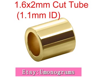 May include: Gold-colored metal tube with a 1.6 mm by 2 mm outer diameter and a 1.1 mm inner diameter. The tube is cut and has a smooth, polished finish. Etsy: Umonograms.