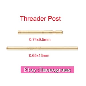 May include: Two gold-colored threading posts, one measuring 0.74x9.5mm and the other 0.65x13mm. The smaller post is labeled "1/20 14K".