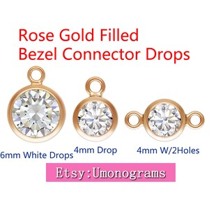 Peut inclure: Trois gouttes de connecteur en bélière remplies d'or rose avec des pierres de zircone cubique transparentes. Les gouttes sont disponibles en 6 mm, 4 mm et 4 mm avec deux trous. Etsy : Umonograms