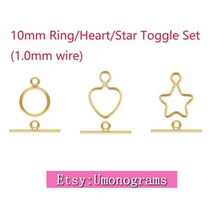 May include: Set of three gold-toned metal toggle clasps, each measuring 10 mm in diameter. The clasps are shaped like a circle, a heart, and a star. The clasps are made of 1.0 mm wire. The text "Etsy: Umonograms" is visible at the bottom of the image.