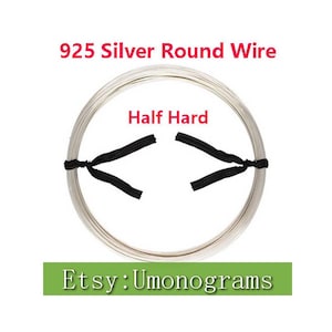 May include: A coil of 925 silver round wire, half hard, for jewellery making. The wire is silver in colour and is coiled in a circle. The text "925 Silver Round Wire" and "Half Hard" is visible in the image. The text "Etsy: Umonograms" is visible at the bottom of the image.