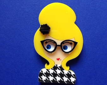 DENISE Acrylic Brooch. Hairbun, black flower hair clip, 50&#39;s glasses and houndstooth pattern dress.