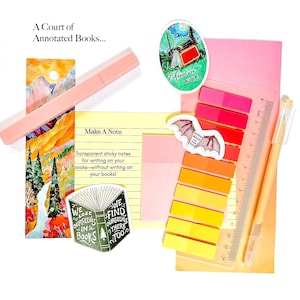 May include: A stationery set featuring a mountain landscape bookmark, a peach highlighter, a clear ruler, and a yellow notepad with the text Make A Note. Includes stickers of a book, a bat, and a forest scene with the text Adventure awaits.