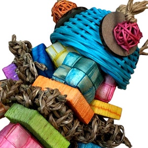 May include: A colorful bird toy for small pets, featuring a woven blue basket, a woven pink ball, and various wooden and woven pieces in shades of orange, yellow, green, blue, and purple.